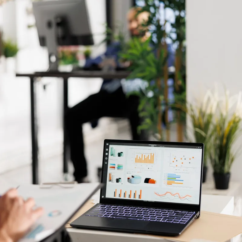 A digital marketer working on a laptop at Digigiri